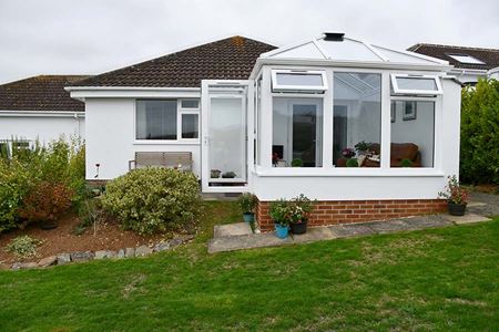 White uPVC Elizabethan conservatory with open windows